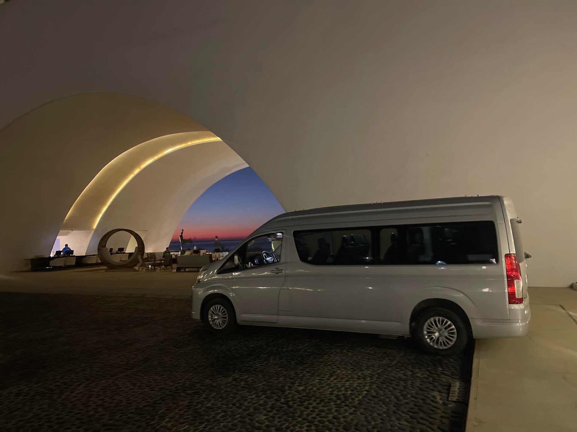 Van at a luxury Cabo resort entrance